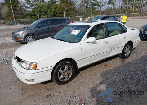 1999 Toyota Avalon Xls z USA, uszkodzony, nr VIN 4T1BF18B0XU301241